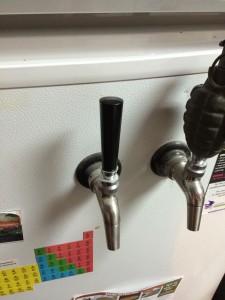 The plain, boring tap handle that is going to be replaced.